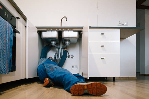 Professional Plumbing technician working in Centre, AL